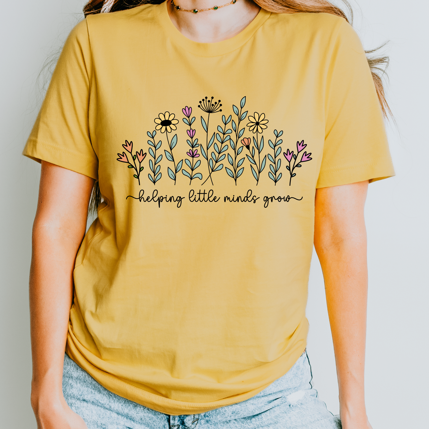 Helping Little Minds Grow Teacher Shirt